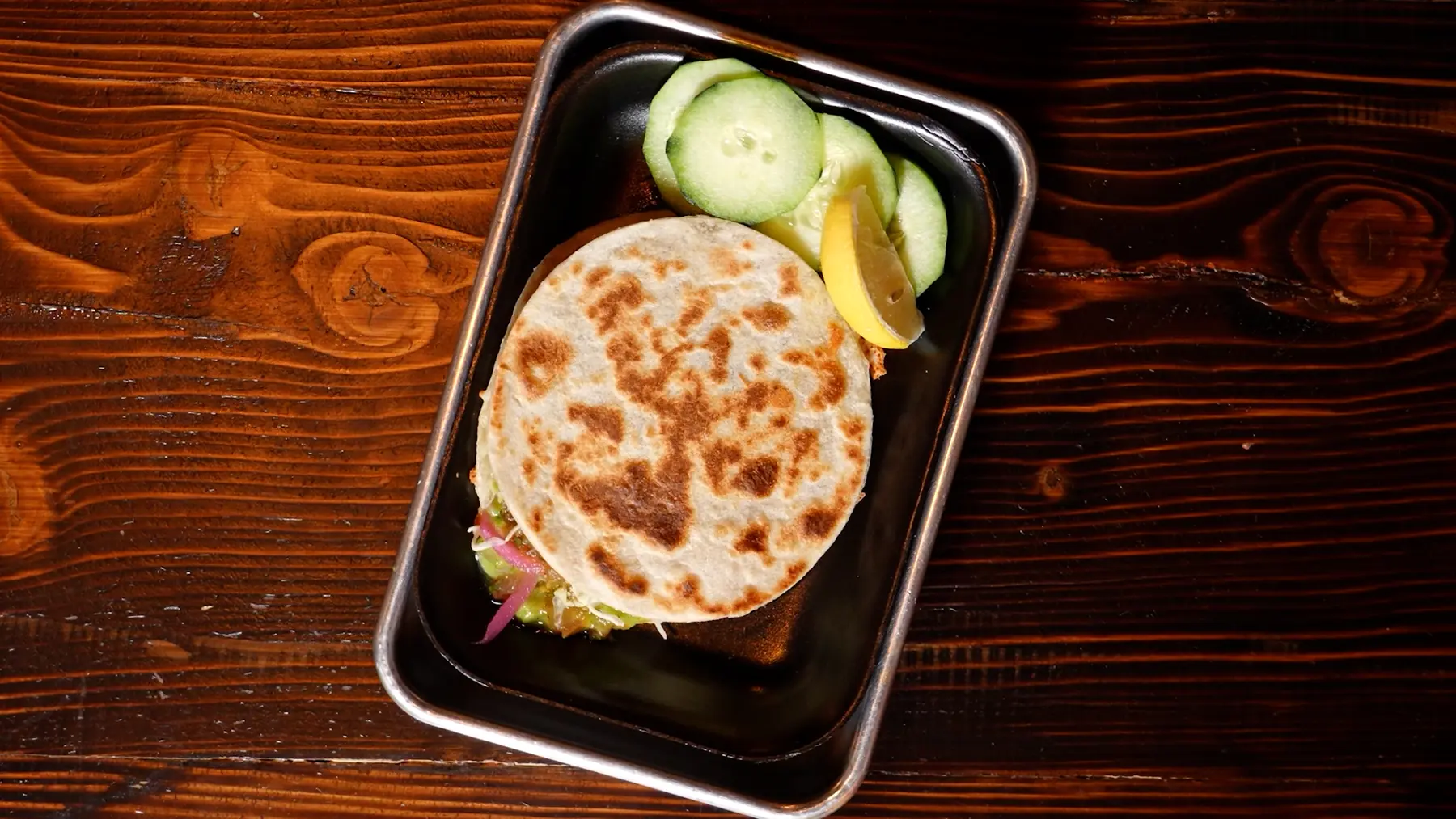 Griddled quesadilla served with fresh sides