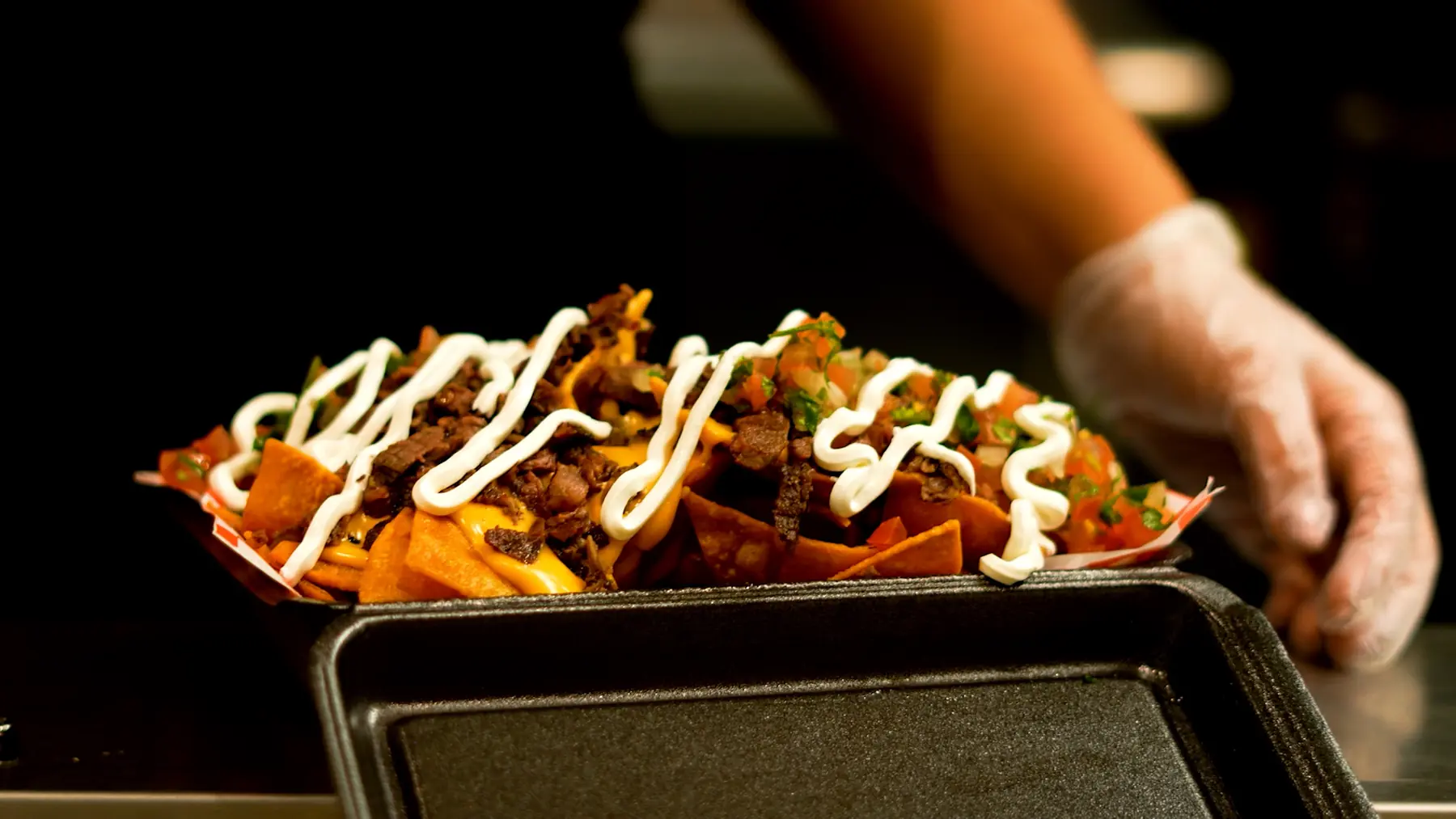 Carbo-Nachos finished with sauce