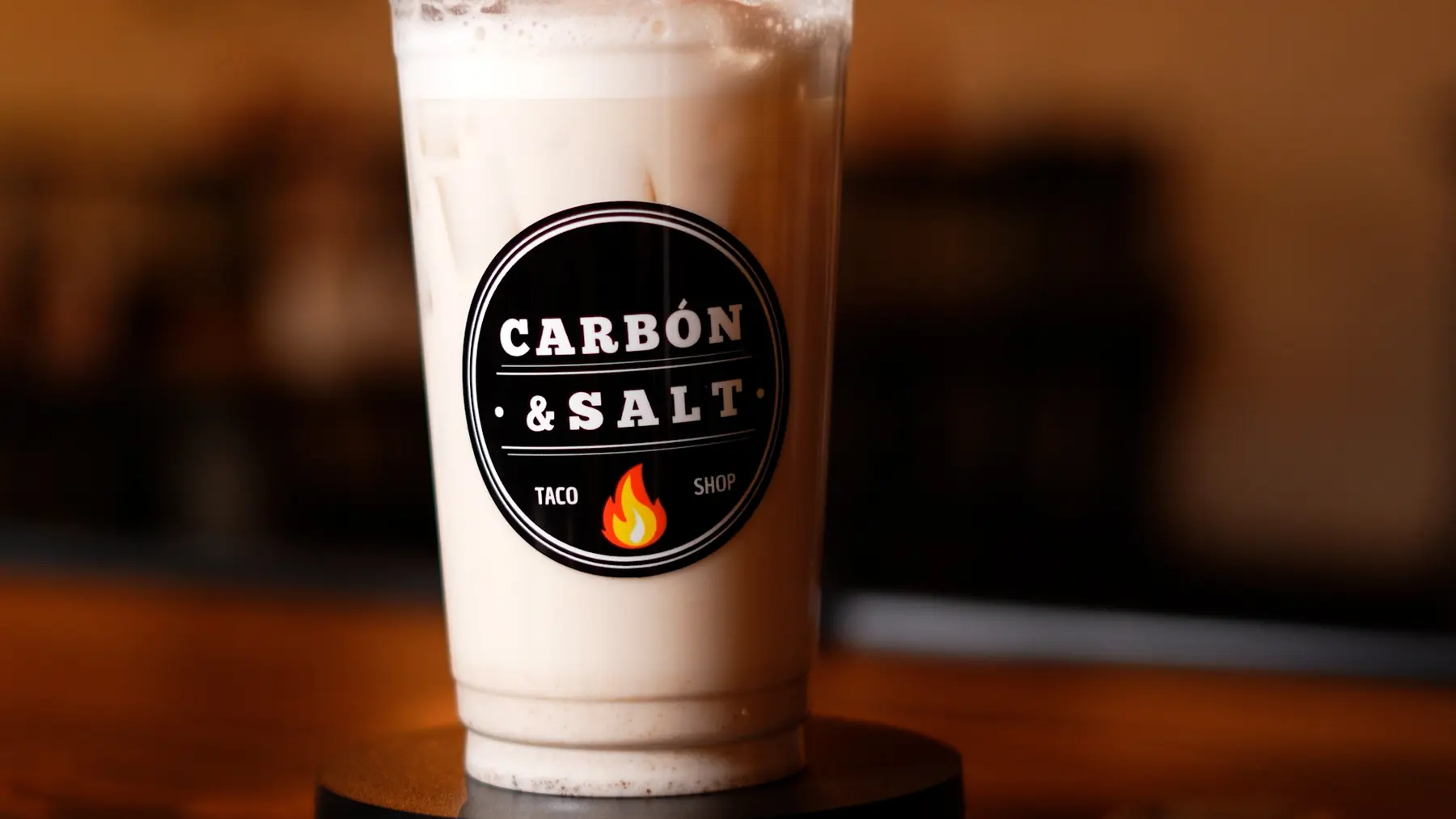 Cold horchata featuring the Carbon and Salt logo